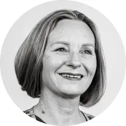 Helen Lindsay. Helen is a white woman with a dark blonde chin-length bob and is smiling.