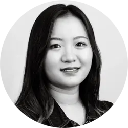 Hermione Sun. Hermione is a young Chinese woman with long dark hair. She is wearing a dark coloured shirt.